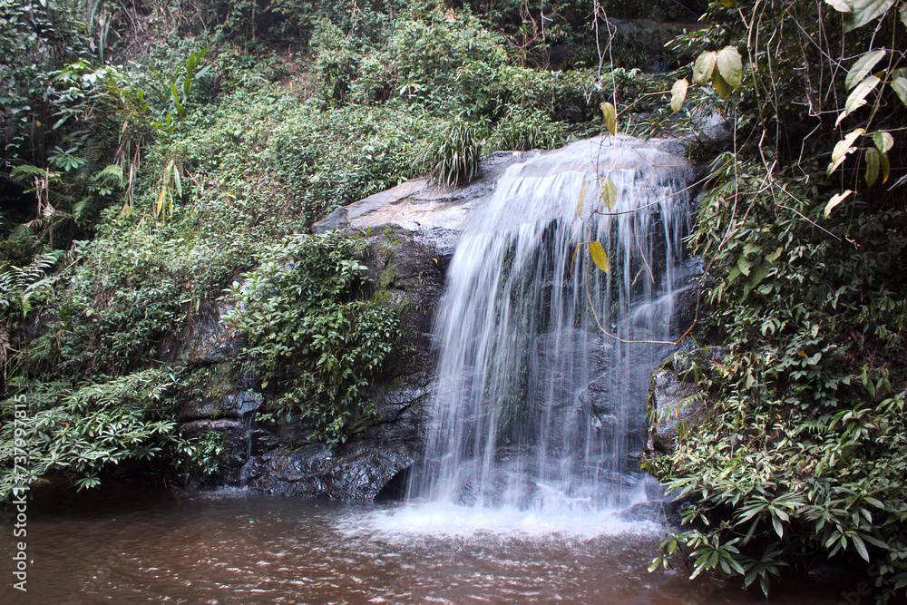 Obraz premium Monthathan Waterfall Trail, a popular trail for hiking and walking near Mueang Chiang Mai in northern Thailand.