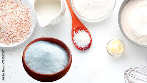 fresh white sugar and baking powder and grind kitchen items background design photo