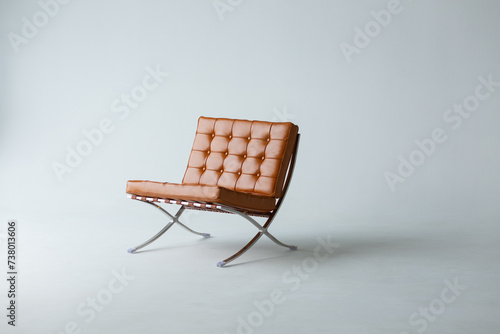 Orange leather chair on a white background