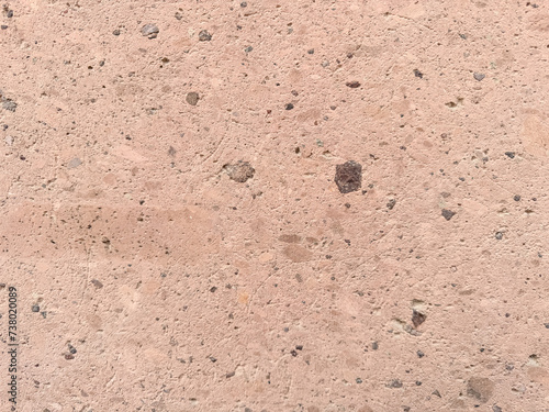Schilderij op canvas Speckled Pink Concrete Surface with Small Stones.