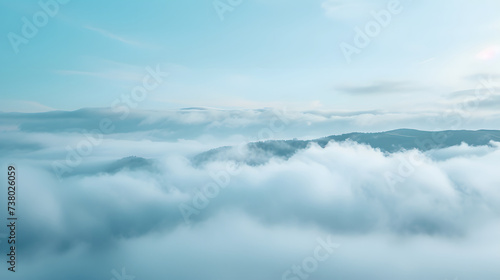 Mountain Peaks Above Clouds Serene Landscape