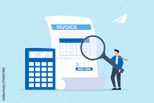 Businessman examining invoice document with magnifier