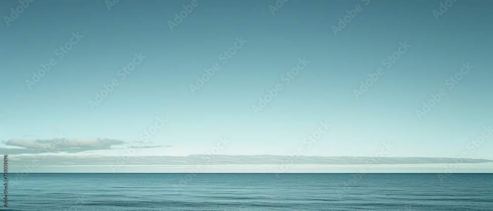 Fototapeta premium Serene Ocean Horizon with Clear Blue Skies