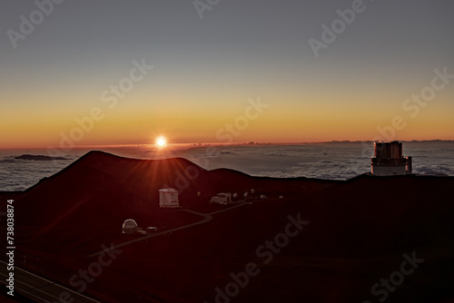 Mauna Kea Volcano s Summit along the Scenic Drive Above the Clouds at Sunset with Observatory 