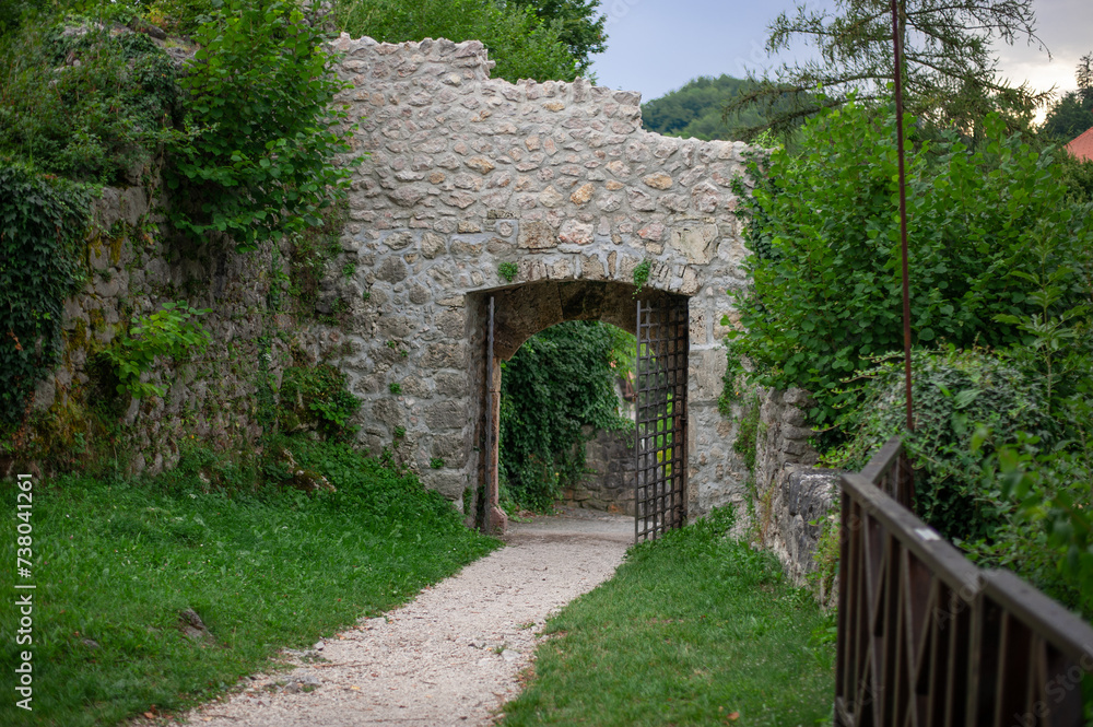 gates in a stone castle mediaeval wall gates in a stone castle mediaeval wall
