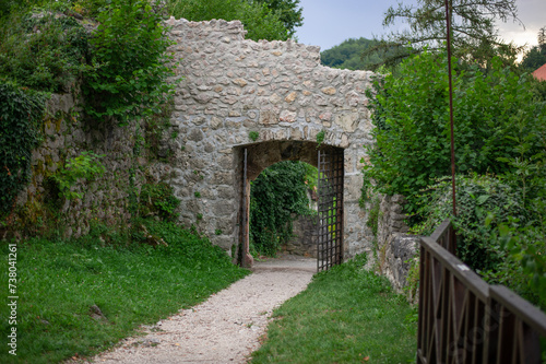 Fototapeta Naklejka Na Ścianę i Meble -  gates in a stone castle mediaeval wall