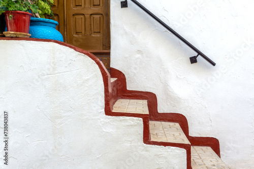 Whitewashed Wall with Stairs. Frigiliana, Spain. photo