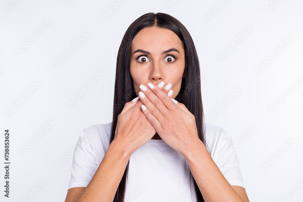 Photo of young woman close cover lips hands afraid scared fail mistake worried nervous isolated over white color background Photo of young woman close cover lips hands afraid scared fail mistake worried nervous isolated over white color background