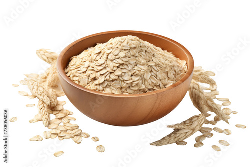 Bowl Filled With Oats Next to Pile of Oats. A bowl filled with oats sits beside a pile of oats, showcasing the abundance of the nutritious grain.