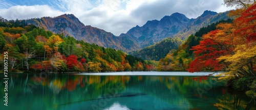 Serene Autumn Lake with Vibrant Foliage Reflection