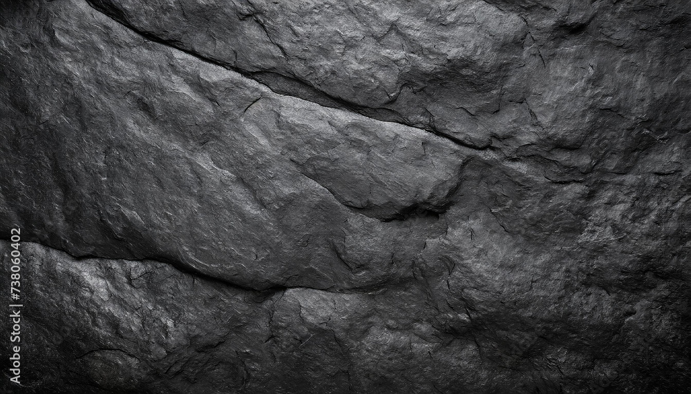 A close-up of dark, rugged rock textures, highlighting the intricate patterns and deep shadows, Ideal for backgrounds, nature themes, or abstract art. A close-up of dark, rugged rock textures, highlighting the intricate patterns and deep shadows, Ideal for backgrounds, nature themes, or abstract art.