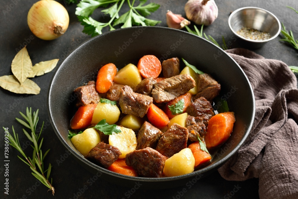 Beef stew with potatoes, carrots and greens Beef stew with potatoes, carrots and greens