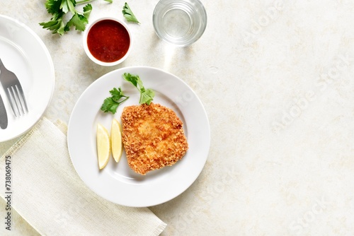 Fototapeta Naklejka Na Ścianę i Meble -  Homemade breaded chicken schnitzel