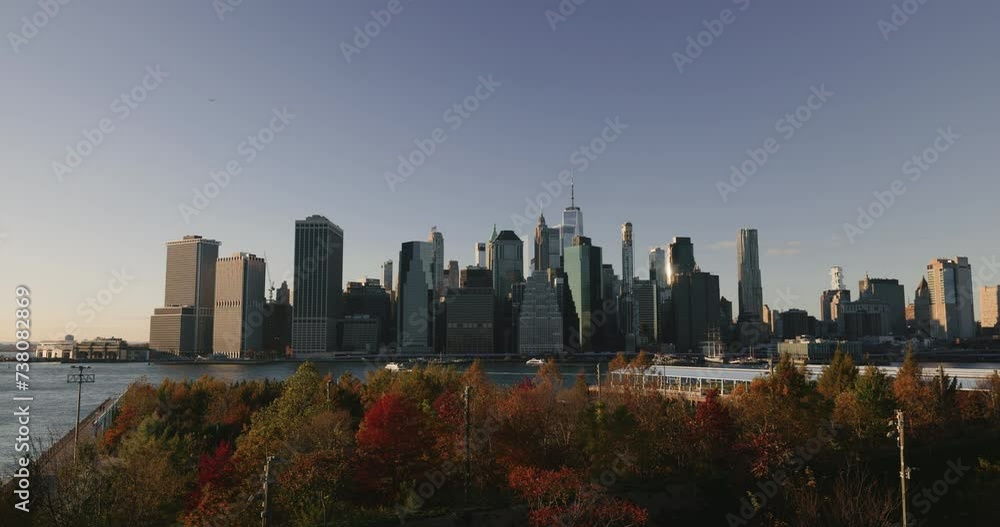 Static shot of iconic view of Manhattan from Brooklyn Bridge Park. Autumnal panorama of Manhattan. Static shot of iconic view of Manhattan from Brooklyn Bridge Park. Autumnal panorama of Manhattan.