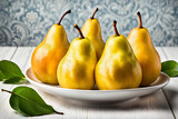 The ripe yellow pears are arranged on a white plate against an intricate background.