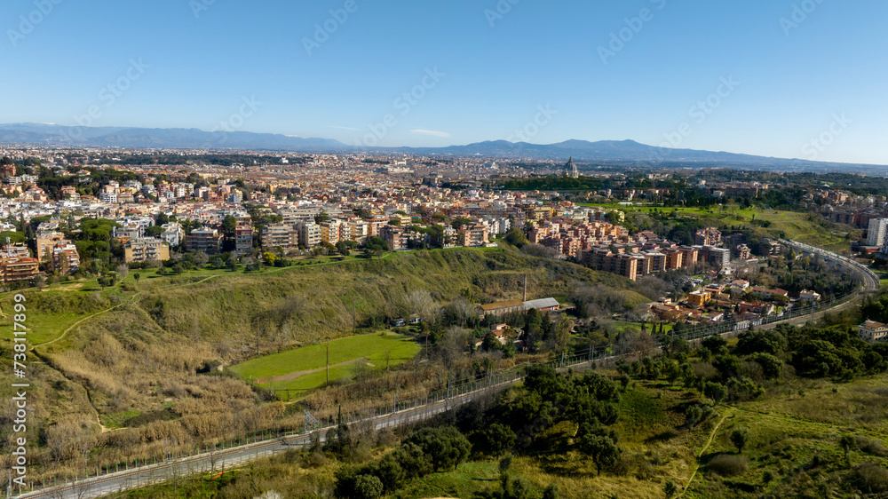 Aerial view of the Balduina neighborhood in Rome, Italy. In the background the dome of St. Peter's Basilica in Vatican City. In the foreground Monte Ciocci.