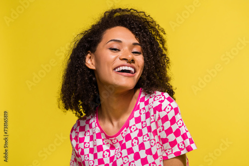 Photo of positive pretty lady toothy smile laugh have good mood isolated on vibrant yellow color background © deagreez