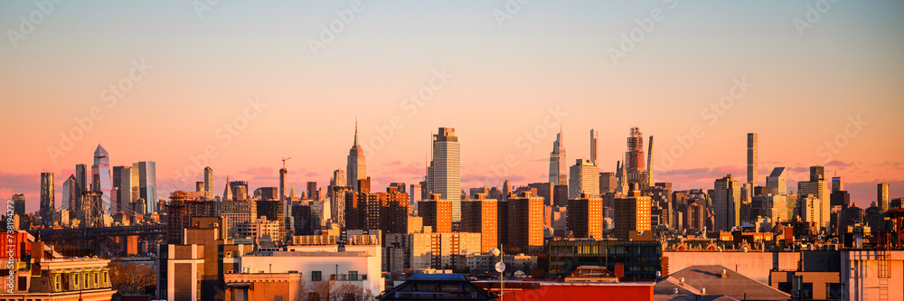Fototapeta premium New York City Skyline and High Rise Buildings at Sunrise