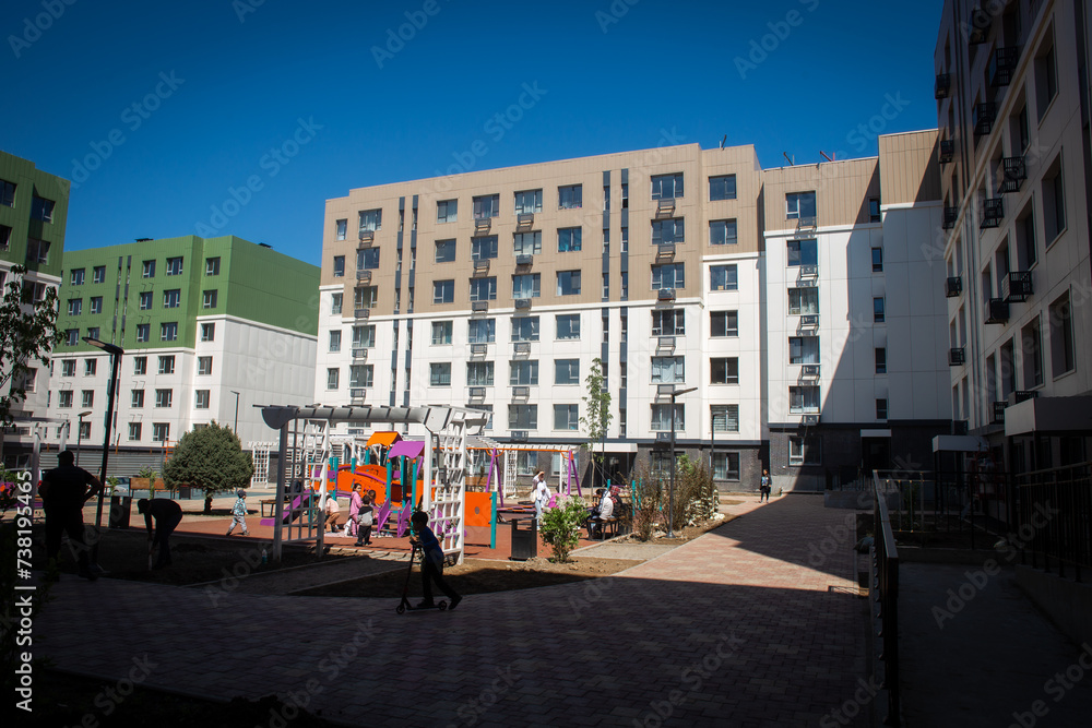 Residential buildings with a playground in the courtyard