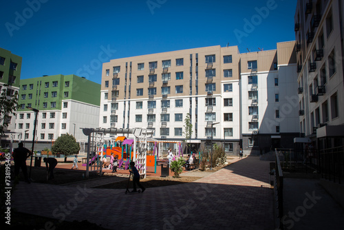 Residential buildings with a playground in the courtyard