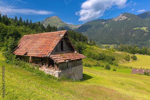 Wooden house in swiss village Lungern, canton of Obwalden, Switzerland photo