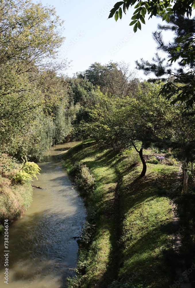 Obraz premium rural landscape with river 