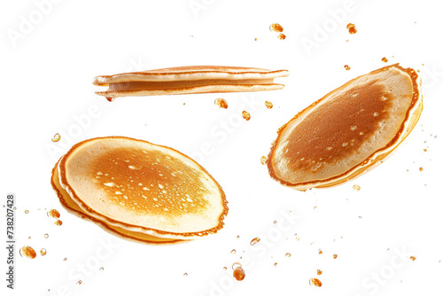 Half of Pancake on White Surface. A photo of a pancake cut in half placed on a white surface, showcasing its texture and golden brown color. photo