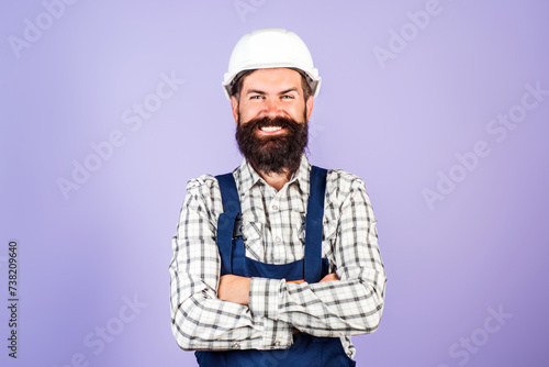 Builder worker. Handyman in hardhat. Builder foreman. Man in helmet studio portrait. Engineer worker in hardhat. Construction site manager. Construction site workers with builders equipment.