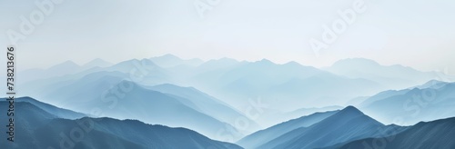 Hills and mountains in fog. Horizontal landscape photography. Panoramic aerial view. Image for banner, blog, advertisement.