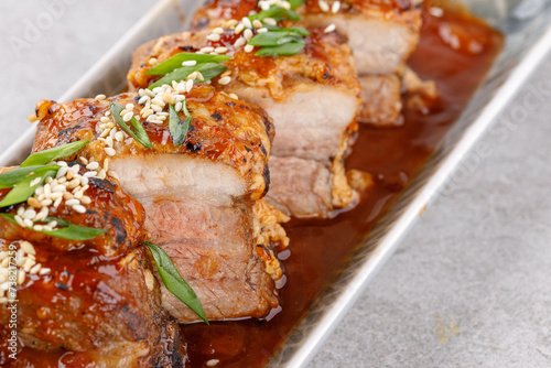 roasted appetizing pork on a stone background studio food photo 9