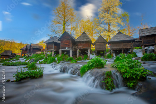 Historical wooden watermills in Jajce, Bosnia and Herzegovina photo