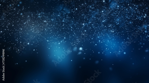 Particules scintillantes et brillantes bleues volant sur fond sombre. Lumière et paillettes flou. Bleu. Fond pour bannière, conception et création graphique.
