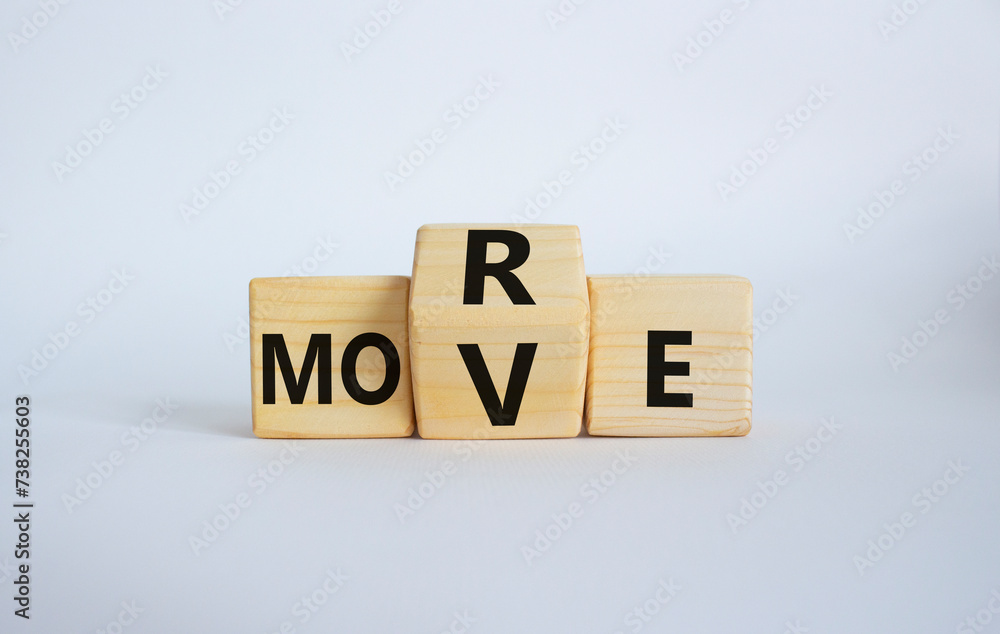 More Move symbol. Wooden cubes with words More Move. Beautiful white background. Business concept and More Move. Copy space More Move symbol. Wooden cubes with words More Move. Beautiful white background. Business concept and More Move. Copy space