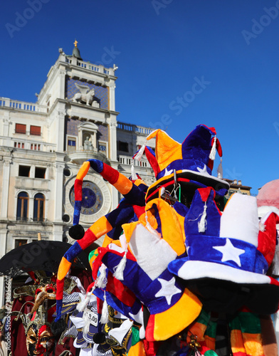 Venice, VE, Italy - February 13, 2024: headdresses and masks for sale in the Venetian carnival stall