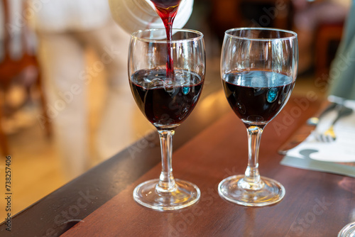 Red dry wine in glasses, lunch with wine in France, Limouges, France