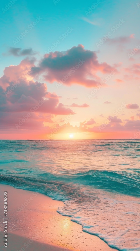 Colorful sunset on sandy tropical beach with beautiful sky, clouds, soft waves
