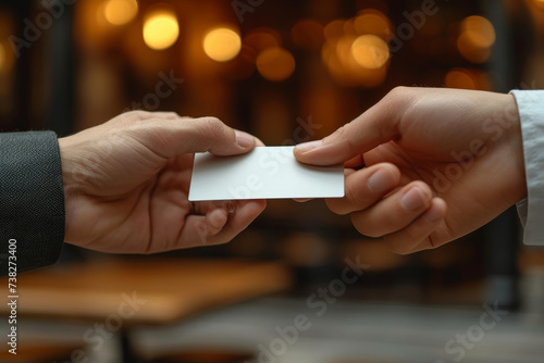 A hand exchanging a business card signifies the initiation of a professional connection, emphasizing the role of networking and relationship-building in expanding business. Generative Ai.