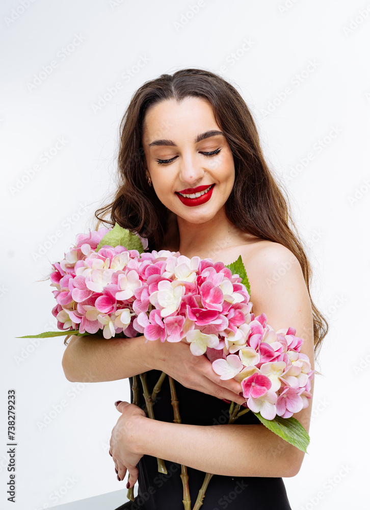 Beautiful young woman with bouquet of flowers on white background Beautiful young woman with bouquet of flowers on white background