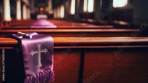 Estola roxa, estendida sobre apoio de do banco da igreja, luz dramatica, tendencia religiosa, pascoa photo