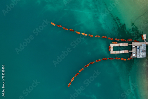 Boat in the lake of Lake Lago di Braies in Italian dolomites