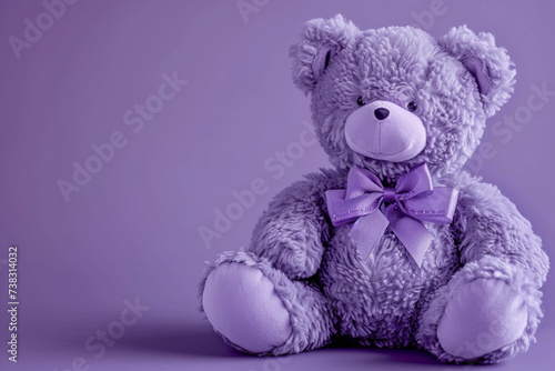 Teddy bear with purple ribbon. Epilepsy awareness day