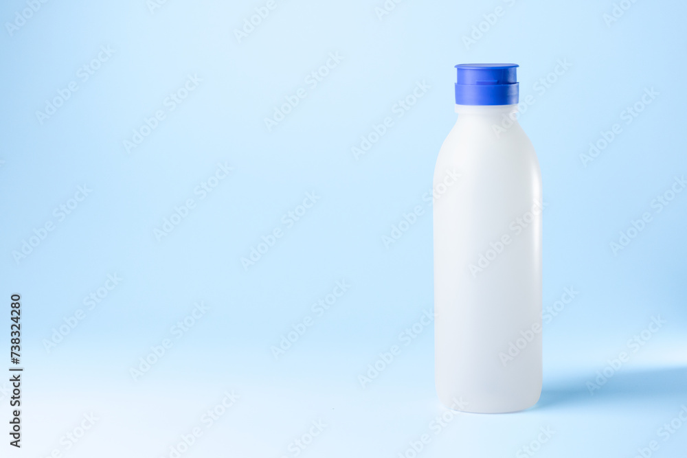 bottle syringe for injectable medication on blue background bottle syringe for injectable medication on blue background
