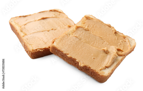 Tasty peanut butter sandwiches on white background