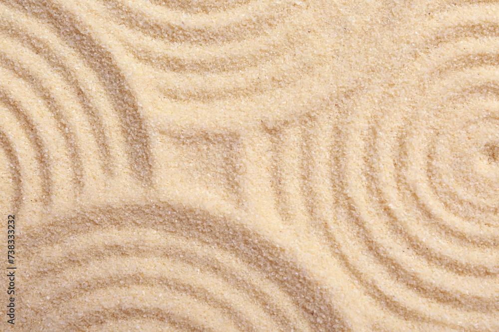 Zen rock garden. Circle patterns on beige sand, top view Zen rock garden. Circle patterns on beige sand, top view