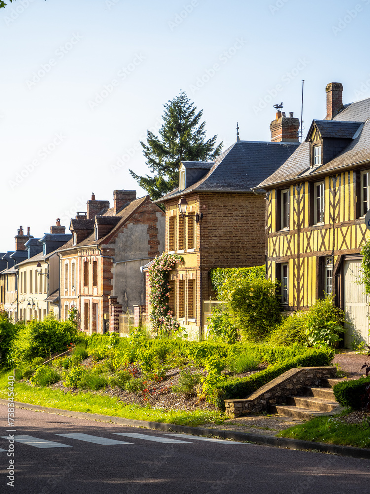 Brick and half-timbered facades of traditional houses in Normandy