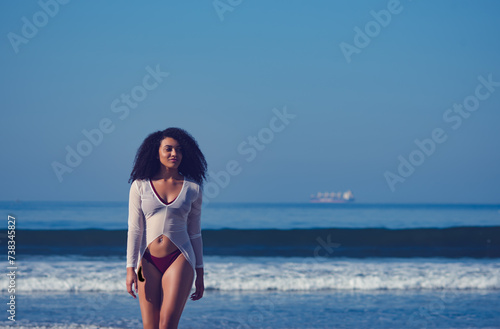Woman Walking from The Ocean