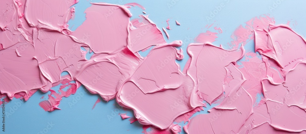 pink oil paint texture on blue background