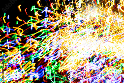 Fototapeta Naklejka Na Ścianę i Meble -  Psychedelic abstract long exposure motion colour lights. Light trails, leaks and glowing electricity. Music visualisation abstraction background. Christmas holiday festive lights.