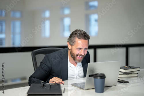Business offices place. Businessman working with laptop in office. Business man director using laptop. Millennial manager at office workplace. Office workers business people at office.