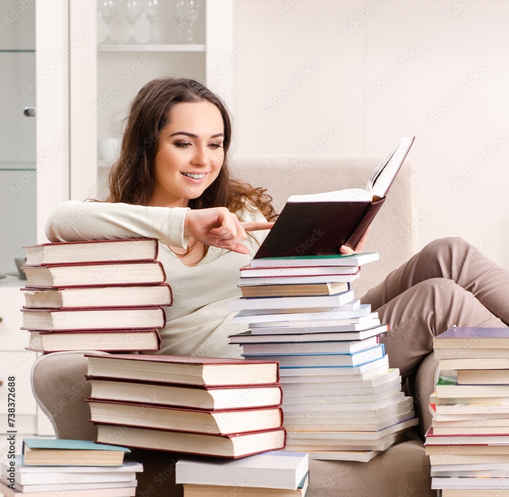Young female student preparing for exams at home Young female student preparing for exams at home